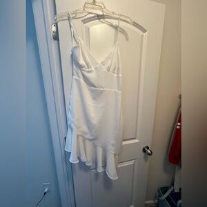 White dress from revolve. New never worn. Size medium